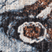 Detail of a CamRugs.Ca grey marble area rug, made from recycled materials.