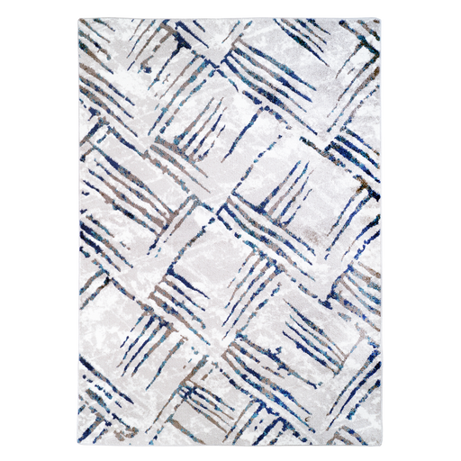 A grey and blue area rug with distressed abstract designs.