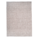 A beige flat weave outdoor rug with wavy geometric designs.
